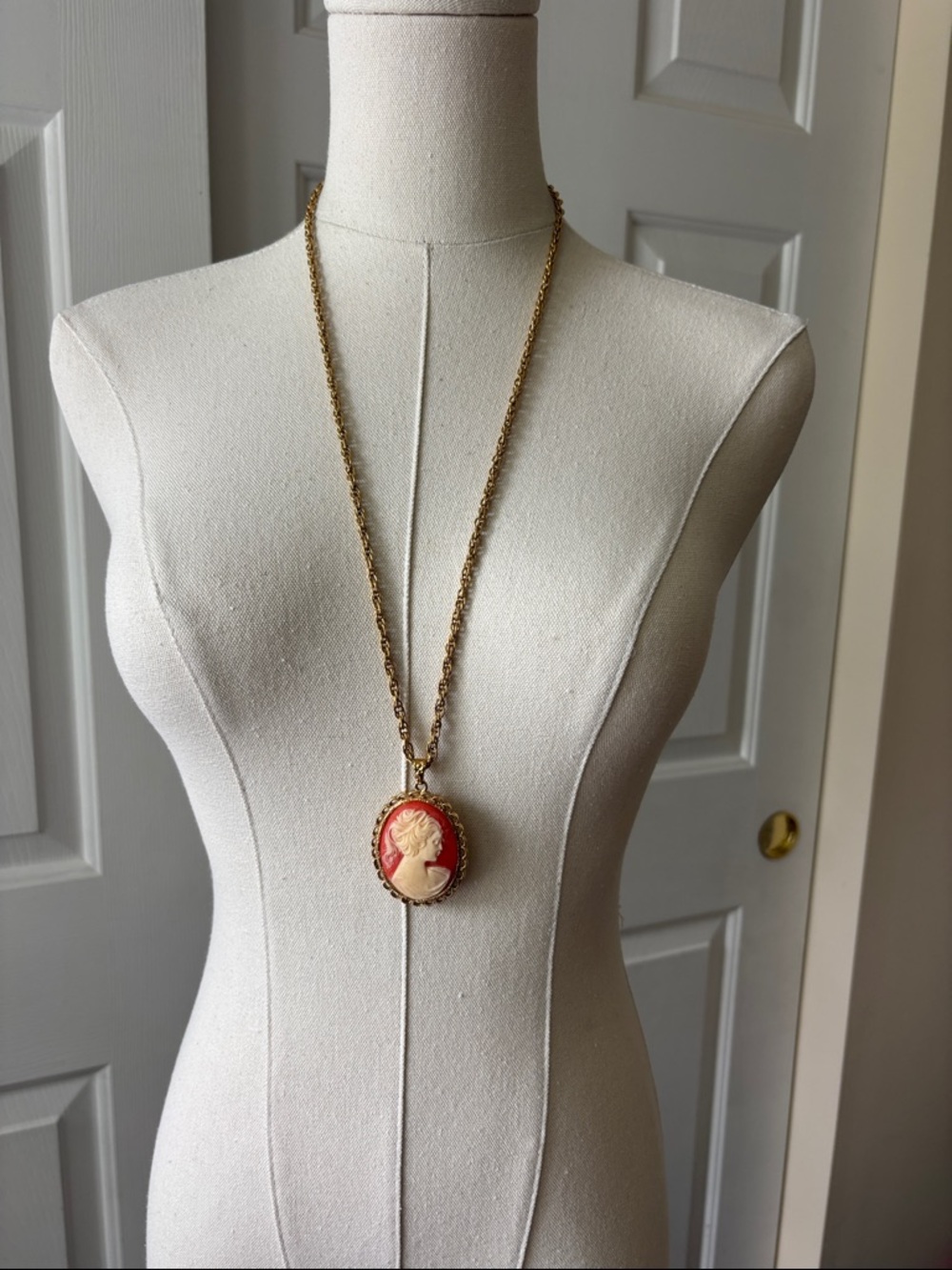 1928 Gold-Tone Chain with Coral and Cream Cameo Pendant over 27”